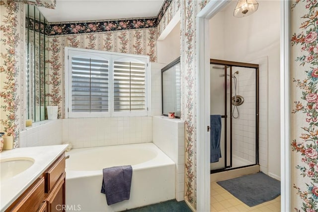 10880 Colusa St, Rancho Cucamonga, CA 91701 - bathroom featuring a bath, wallpapered walls, a stall shower, vanity, and tile patterned floors
