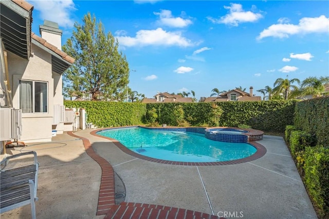 10880 Colusa St, Rancho Cucamonga, CA 91701 - view of pool with a patio area, a fenced backyard, and a pool with connected hot tub