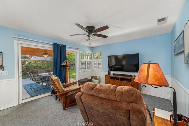10880 Colusa St, Rancho Cucamonga, CA 91701 - living area featuring carpet, ceiling fan, and a wainscoted wall