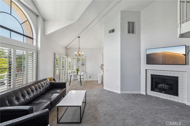18107 Erik Ct Unit 462, Canyon Country, CA 91387 - carpeted living area featuring a chandelier, high vaulted ceiling, baseboards, healthy amount of natural light, and a tile fireplace