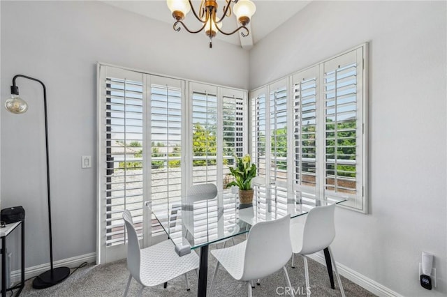 18107 Erik Ct Unit 462, Canyon Country, CA 91387 - carpeted dining area featuring a chandelier and baseboards