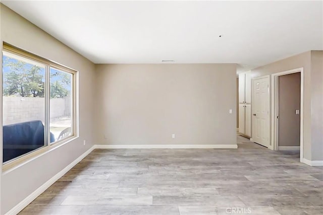 17175 Micallef St, Fontana, CA 92336 - unfurnished room featuring baseboards and light wood-style flooring