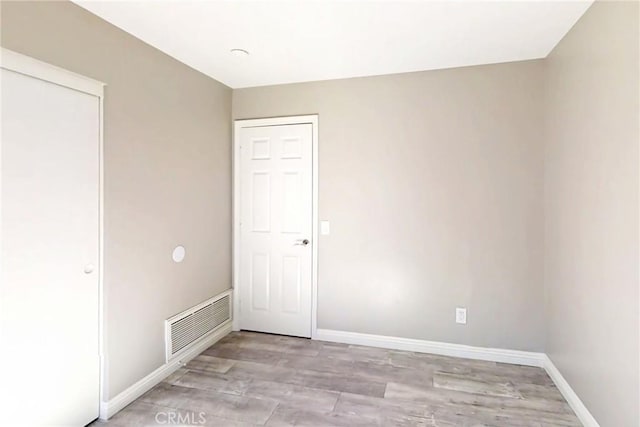 17175 Micallef St, Fontana, CA 92336 - unfurnished bedroom with baseboards and light wood-type flooring