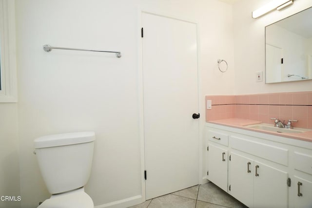 513 E Comstock Ave, Glendora, CA 91741 - bathroom featuring vanity, tile patterned flooring, and backsplash