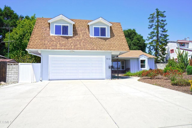 513 E Comstock Ave, Glendora, CA 91741 - view of front of house featuring a shingled roof, concrete driveway, and mansard roof