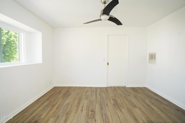 513 E Comstock Ave, Glendora, CA 91741 - unfurnished room featuring wood finished floors and a ceiling fan