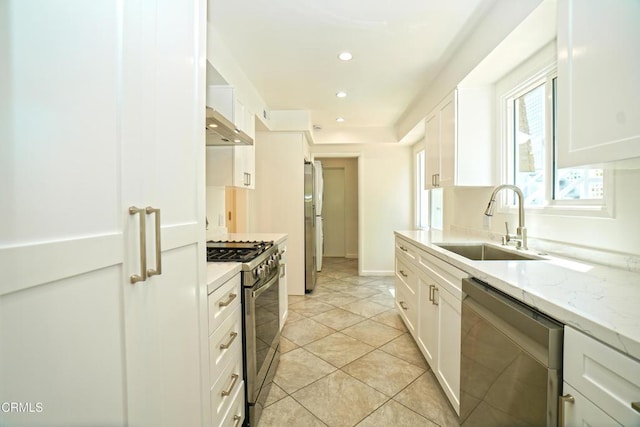 513 E Comstock Ave, Glendora, CA 91741 - kitchen featuring appliances with stainless steel finishes, white cabinetry, recessed lighting, and under cabinet range hood