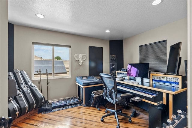 28409 Connick Pl, Saugus, CA 91350 - office space featuring wood finished floors, a textured ceiling, and recessed lighting