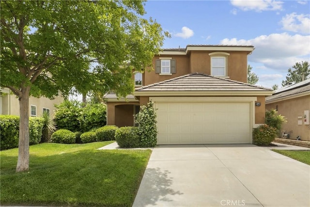 28409 Connick Pl, Saugus, CA 91350 - view of front of property featuring an attached garage, a front lawn, stucco siding, and driveway