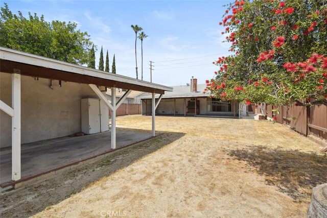 13126 Roscoe Blvd, Sun Valley, CA 91352 - fenced backyard with a patio