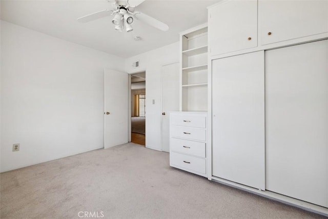 13126 Roscoe Blvd, Sun Valley, CA 91352 - unfurnished bedroom with light colored carpet, a closet, and ceiling fan