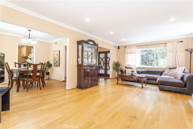 11811 Louise Ave, Granada Hills, CA 91344 - living area with light wood finished floors, a chandelier, recessed lighting, and crown molding