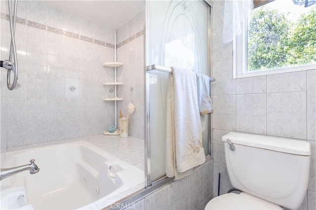 11811 Louise Ave, Granada Hills, CA 91344 - full bathroom featuring toilet, tile walls, and a combined bath / shower with jetted tub