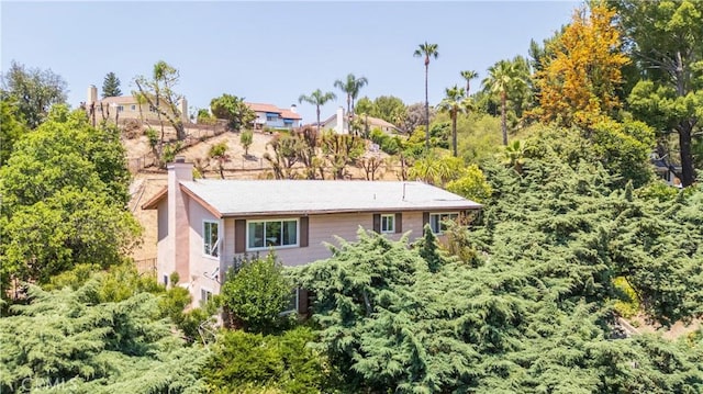 11811 Louise Ave, Granada Hills, CA 91344 - rear view of property with a chimney