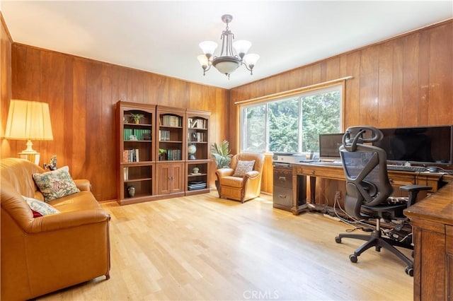 11811 Louise Ave, Granada Hills, CA 91344 - office area with a chandelier, wooden walls, and light wood-type flooring