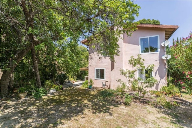 11811 Louise Ave, Granada Hills, CA 91344 - view of property exterior featuring stucco siding