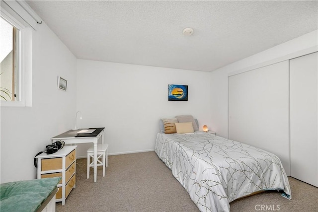 20 Mandrake Way, Irvine, CA 92612 - carpeted bedroom with a textured ceiling and a closet