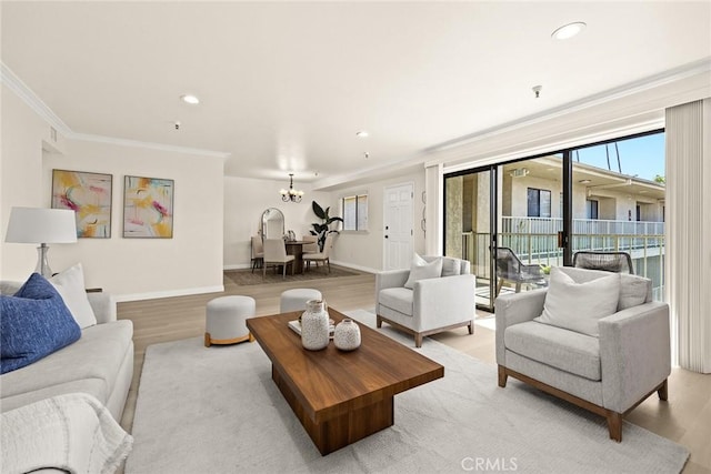 70 N Catalina Ave Unit 306, Pasadena, CA 91106 - living area with ornamental molding, light wood finished floors, a chandelier, recessed lighting, and baseboards