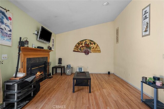 20015 Gilbert Dr, Canyon Country, CA 91351 - living room with wood finished floors and a high end fireplace