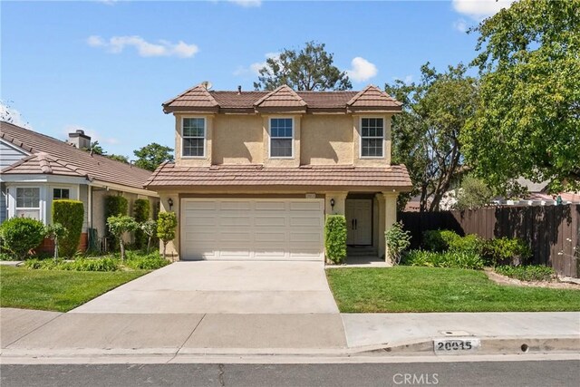 20015 Gilbert Dr, Canyon Country, CA 91351 - traditional home featuring stucco siding, a tiled roof, a garage, and concrete driveway
