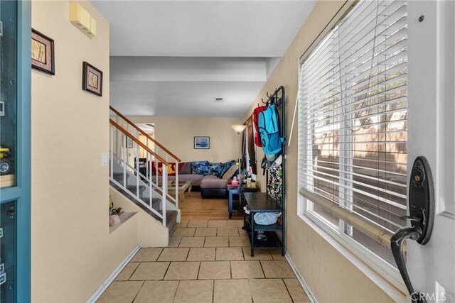 20015 Gilbert Dr, Canyon Country, CA 91351 - hall featuring tile patterned flooring and stairs