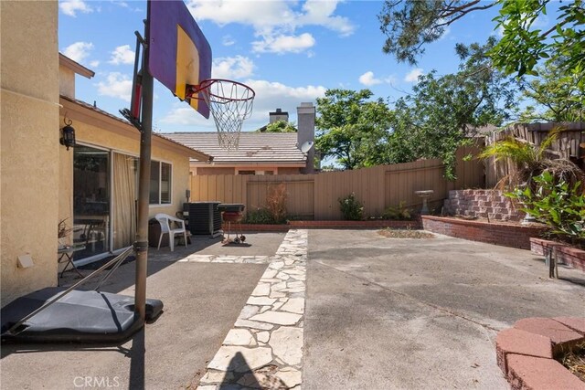 20015 Gilbert Dr, Canyon Country, CA 91351 - fenced backyard featuring cooling unit and a patio