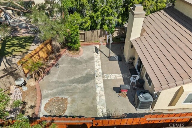 20015 Gilbert Dr, Canyon Country, CA 91351 - fenced backyard with a patio area and central AC unit