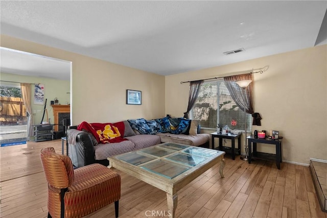 20015 Gilbert Dr, Canyon Country, CA 91351 - living room featuring light wood-style flooring
