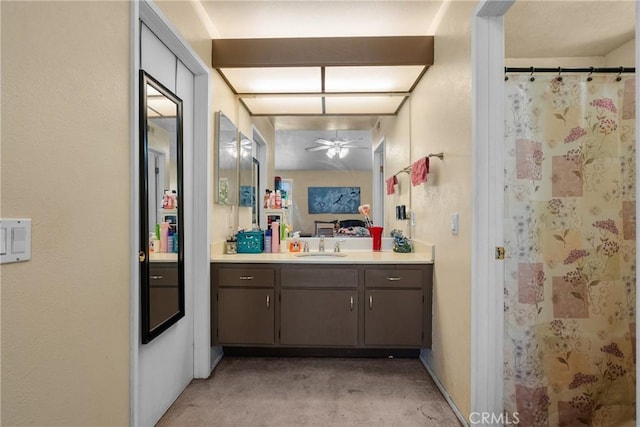 20015 Gilbert Dr, Canyon Country, CA 91351 - bathroom with vanity, ceiling fan, and a shower with shower curtain