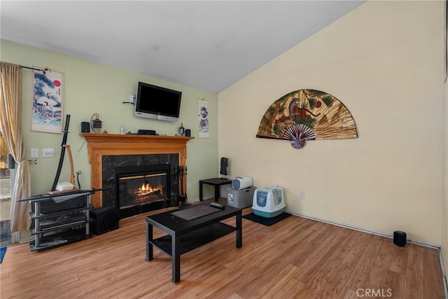 20015 Gilbert Dr, Canyon Country, CA 91351 - living room with wood finished floors, a fireplace, and lofted ceiling