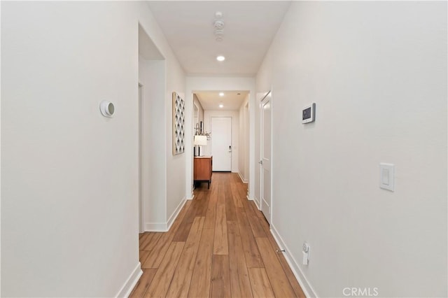 1890 Pele Way, Corona, CA 92882 - corridor with light wood-style flooring, baseboards, and recessed lighting