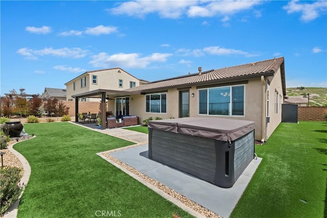 1890 Pele Way, Corona, CA 92882 - back of property with a hot tub, a patio, an outdoor living space, stucco siding, and a tile roof
