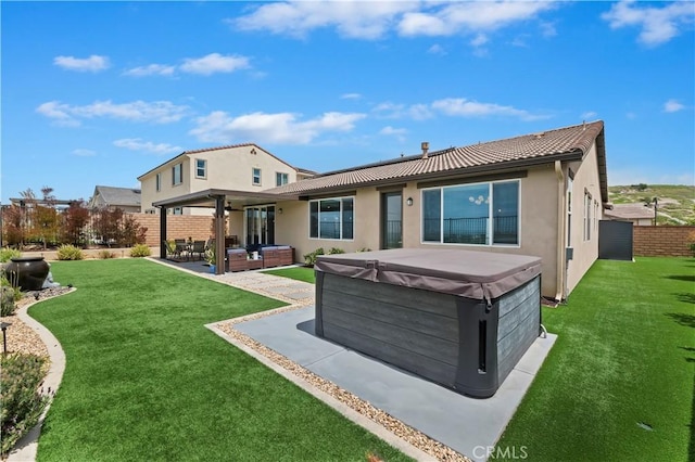 1890 Pele Way, Corona, CA 92882 - rear view of property featuring a hot tub, a patio, an outdoor living space, stucco siding, and a fenced backyard