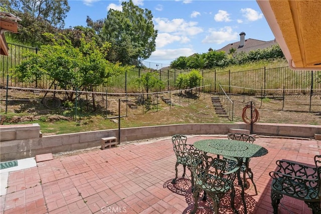 52 Hidden Valley Rd, Monrovia, CA 91016 - fenced backyard featuring a patio and outdoor dining area