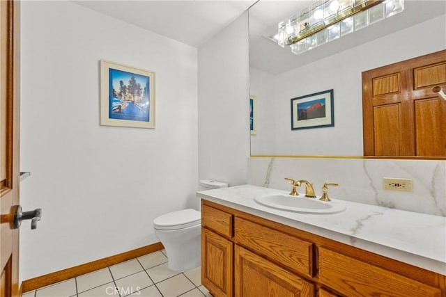 52 Hidden Valley Rd, Monrovia, CA 91016 - bathroom with vanity, toilet, tile patterned flooring, and baseboards