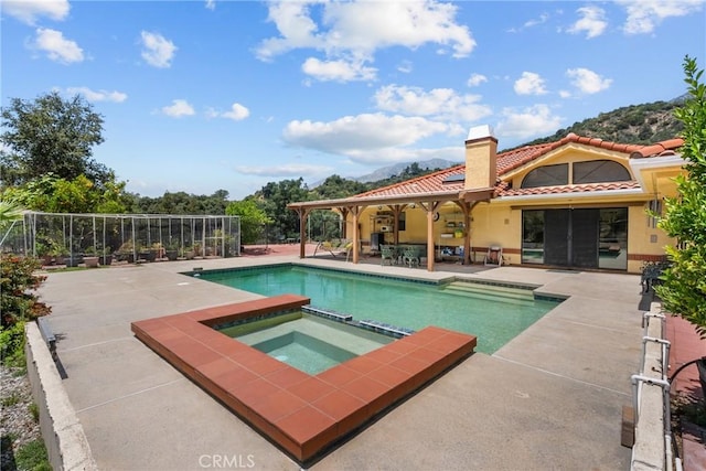 52 Hidden Valley Rd, Monrovia, CA 91016 - view of pool with a patio area, a pool with connected hot tub, and a mountain view