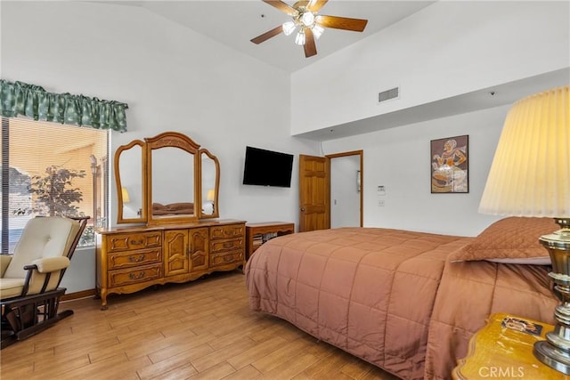 52 Hidden Valley Rd, Monrovia, CA 91016 - bedroom with light wood-type flooring, high vaulted ceiling, and a ceiling fan