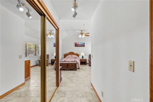 52 Hidden Valley Rd, Monrovia, CA 91016 - bedroom with track lighting, baseboards, a ceiling fan, and a closet