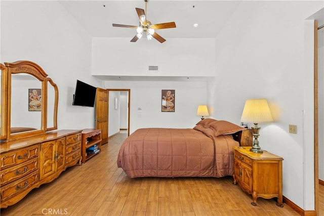 52 Hidden Valley Rd, Monrovia, CA 91016 - bedroom with light wood-type flooring, a towering ceiling, and a ceiling fan