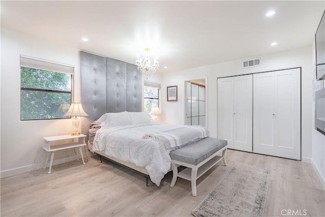 803 Crescent Dr, Monrovia, CA 91016 - bedroom with a chandelier, light wood-style flooring, multiple windows, and recessed lighting