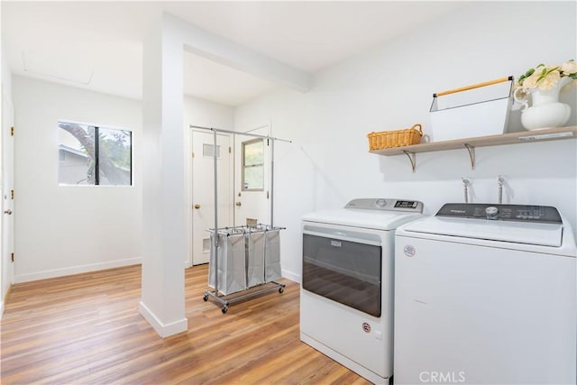 803 Crescent Dr, Monrovia, CA 91016 - laundry area with separate washer and dryer and light wood finished floors