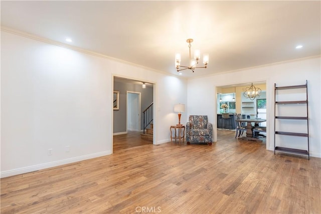 803 Crescent Dr, Monrovia, CA 91016 - living area featuring a chandelier, ornamental molding, stairs, light wood finished floors, and recessed lighting