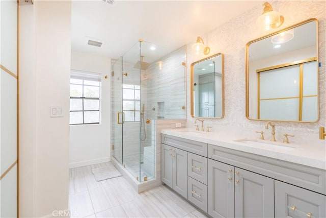 803 Crescent Dr, Monrovia, CA 91016 - bathroom featuring double vanity, a stall shower, tile patterned flooring, and tasteful backsplash
