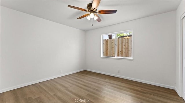 3637 Stauss Ave, Oroville, CA 95966 - spare room with wood finished floors, baseboards, and ceiling fan