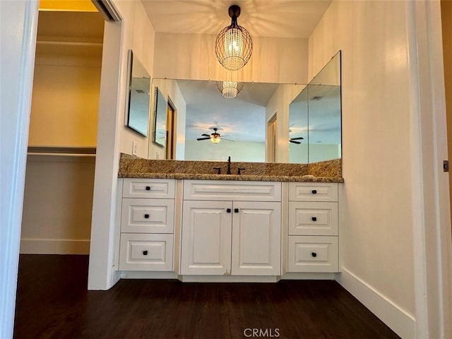1415 Via Vallarta, Riverside, CA 92506 - bathroom featuring wood finished floors, vanity, and a chandelier