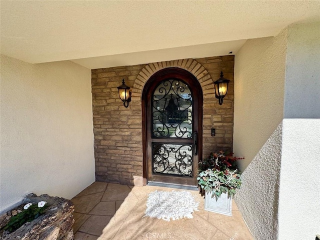 1415 Via Vallarta, Riverside, CA 92506 - view of exterior entry with stucco siding and stone siding