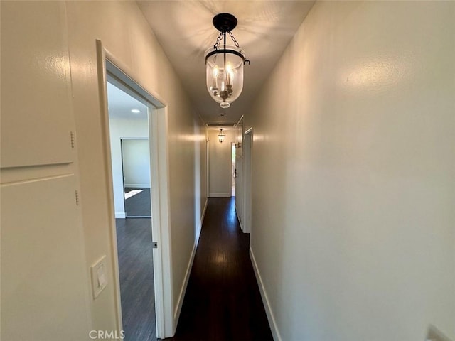 1415 Via Vallarta, Riverside, CA 92506 - corridor with dark wood finished floors and attic access