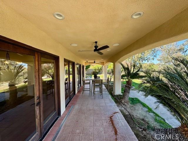 1415 Via Vallarta, Riverside, CA 92506 - view of patio featuring a ceiling fan
