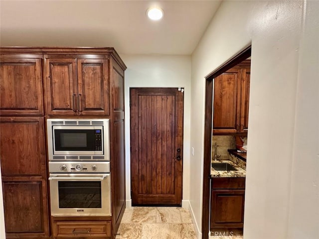 1415 Via Vallarta, Riverside, CA 92506 - kitchen featuring stainless steel appliances and stone countertops