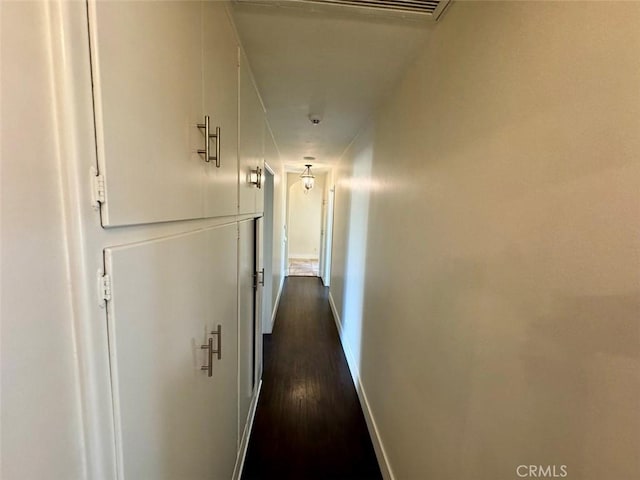 1415 Via Vallarta, Riverside, CA 92506 - hallway with dark wood finished floors and baseboards